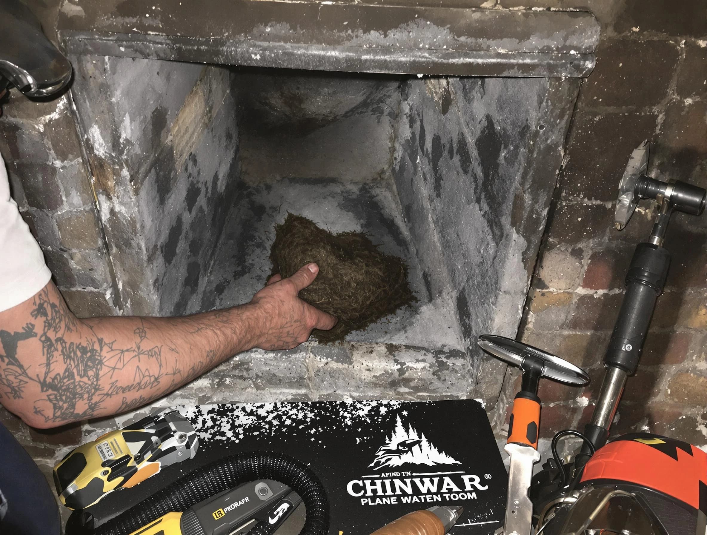 Villa Rica Chimney Sweep safely removing debris and screening chimney in Villa Rica, GA