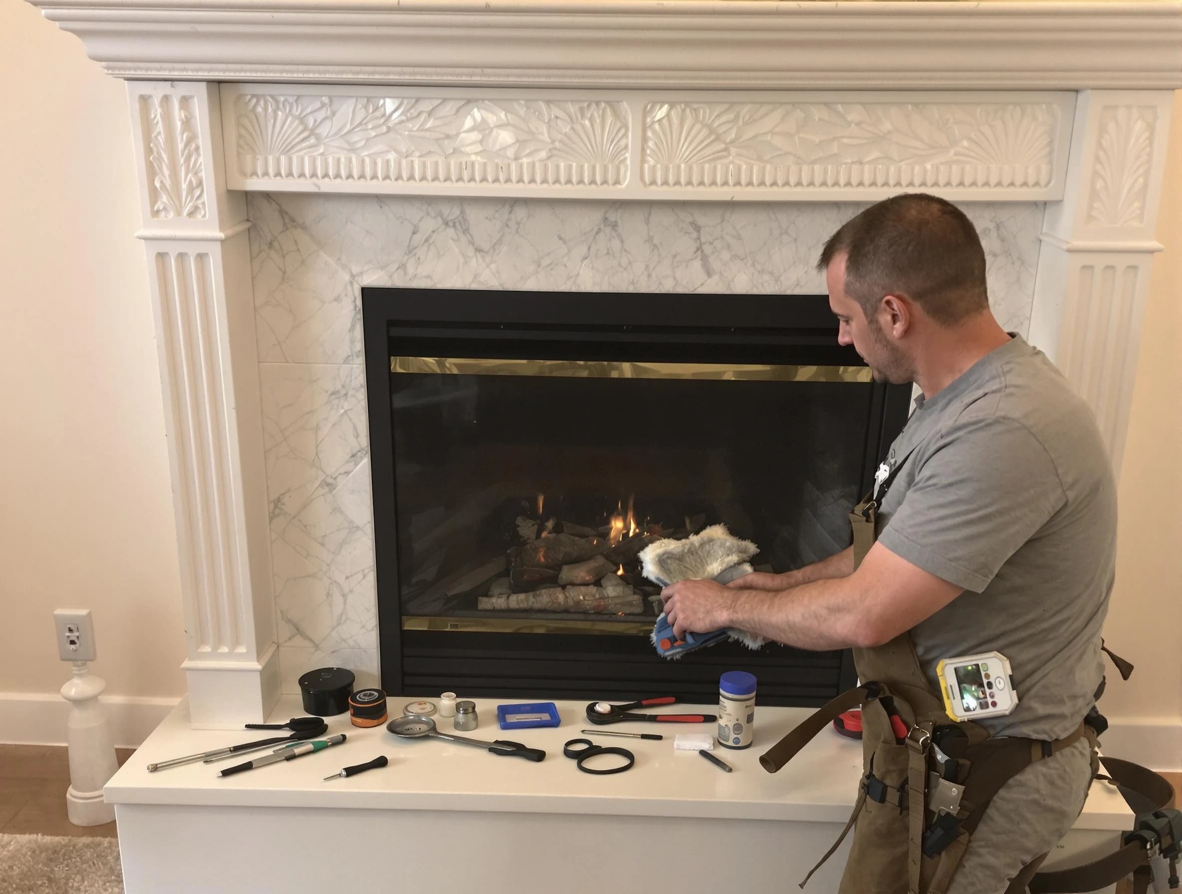 Villa Rica Chimney Sweep performing fireplace maintenance in Villa Rica, GA